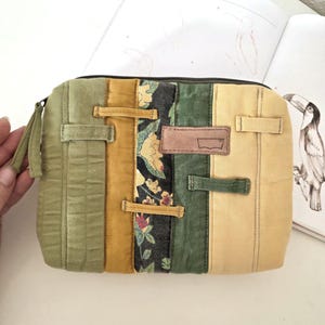 Zipper pouch photographed next to skincare or beauty items to show scale. Eco-friendly, one-of-a-kind piece for gifting or personal use.