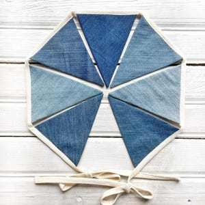 Available in Light Blue or Dark Blue recycled denim – choose your favorite shade.