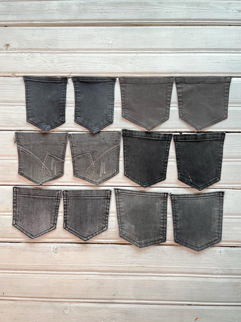 These unique grey denim pockets are reclaimed from pre-loved jeans, perfect for sustainable crafting projects.