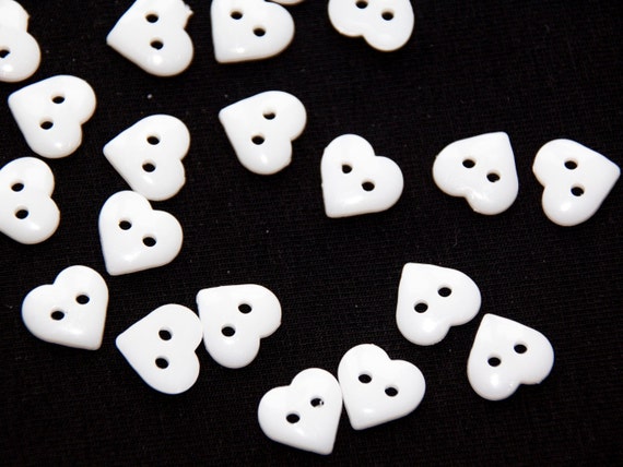 NEW 10 PC PKG. 1/ 2 INCH WHITE HEART SHAPED BUTTONS