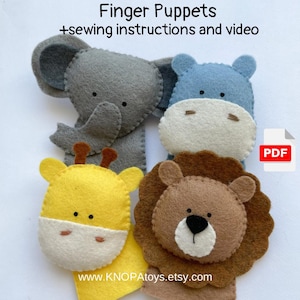 May include: A set of four felt finger puppets featuring an elephant, hippopotamus, giraffe, and lion. The puppets are gray, blue, yellow, and brown. The puppets are designed for children to use for imaginative play. The image includes the text "Finger Puppets +sewing instructions and video PDF".