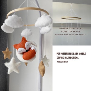 Puede incluir: Un kit de móvil para bebé de bricolaje con un zorro, estrellas y nubes. El kit incluye un patrón PDF, instrucciones de costura y un tutorial en video sobre cómo hacer un anillo de madera para el móvil.