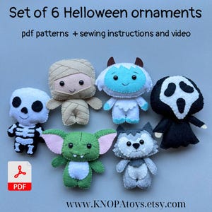 May include: A set of six handmade Halloween ornaments. The collection includes a skeleton, mummy, yeti, Scream mask, goblin, and wolf. The image shows the text "Set of 6 Helloween ornaments" and "pdf patterns + sewing instructions and video". The ornaments are made of felt in various colours.