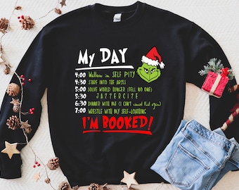 black grinch sweater