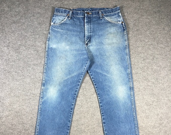 Vintage Wrangler Jeans - 90s Light Wash Denim, Distressed Faded Blue, Classic American Fashion, Unique Gift for Denim Lovers