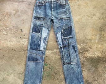 Jeans Levi's 501 vintage hechos a medida, con costuras Sashiko, patchwork reciclado, diseño único.