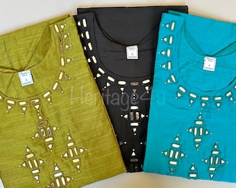 May include: Three women's tops with a geometric design featuring mirrored embellishments. The tops are in olive green, black, and teal.