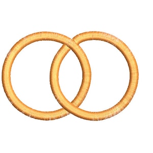 May include: Two interlocking gold rings, symbolising unity and commitment.