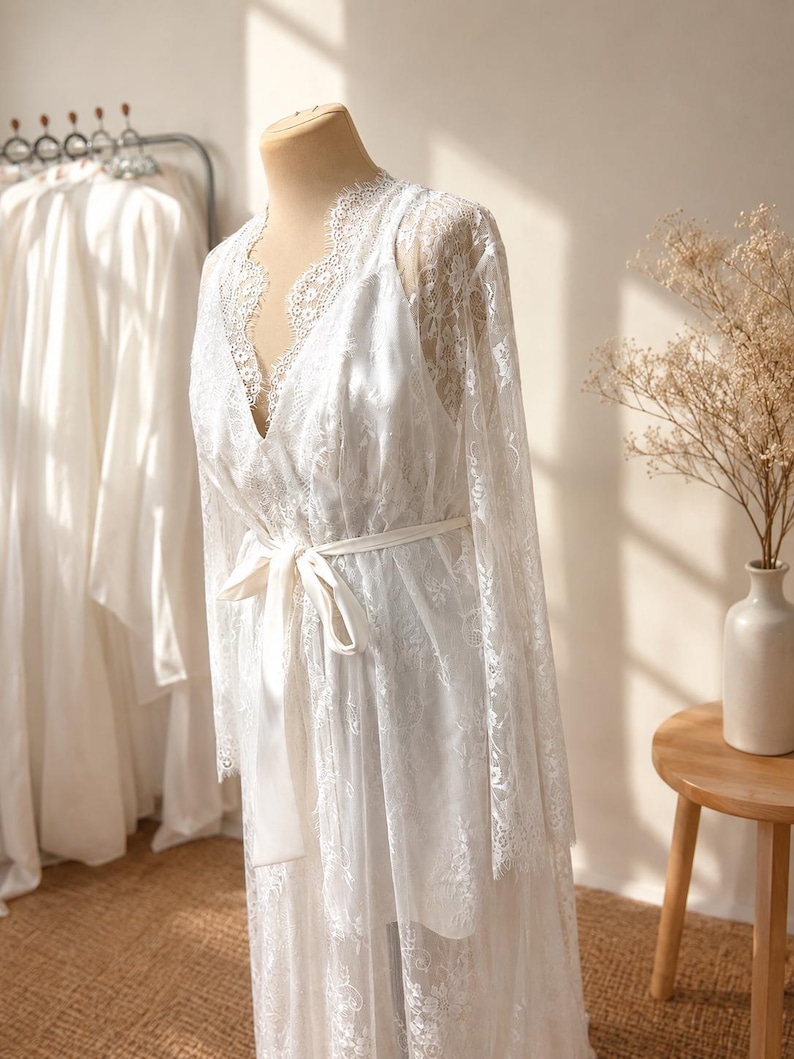 Bridal getting ready robe with lace sleeves and train