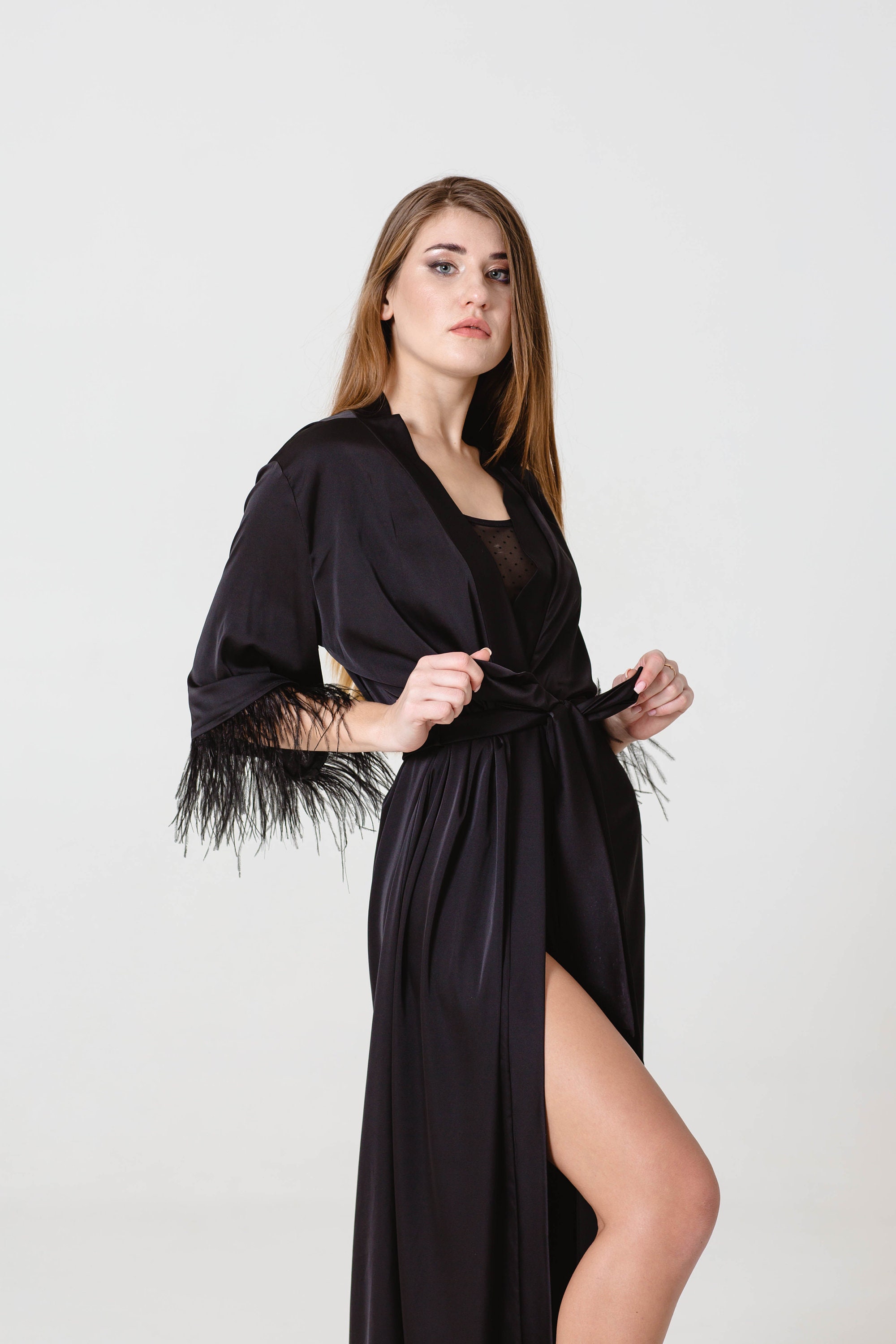 flowy robe with feathers