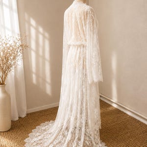 White lace bridal dressing gown with elegant train