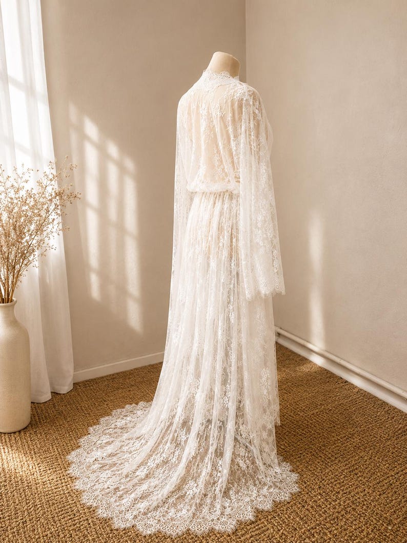 White lace bridal dressing gown with elegant train