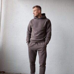 Black casual man's/woman's jumper and trousers set Dark brown