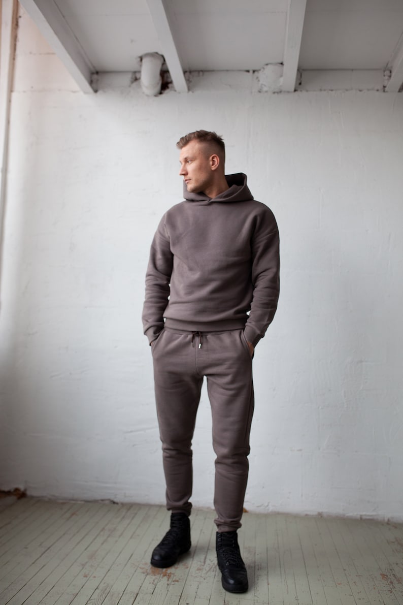 Black casual man's/woman's jumper and trousers set Dark brown