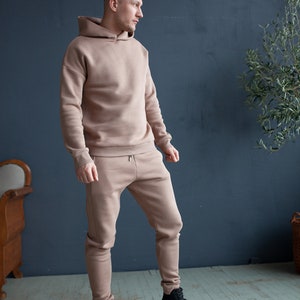 Black casual man's/woman's jumper and trousers set Light brown