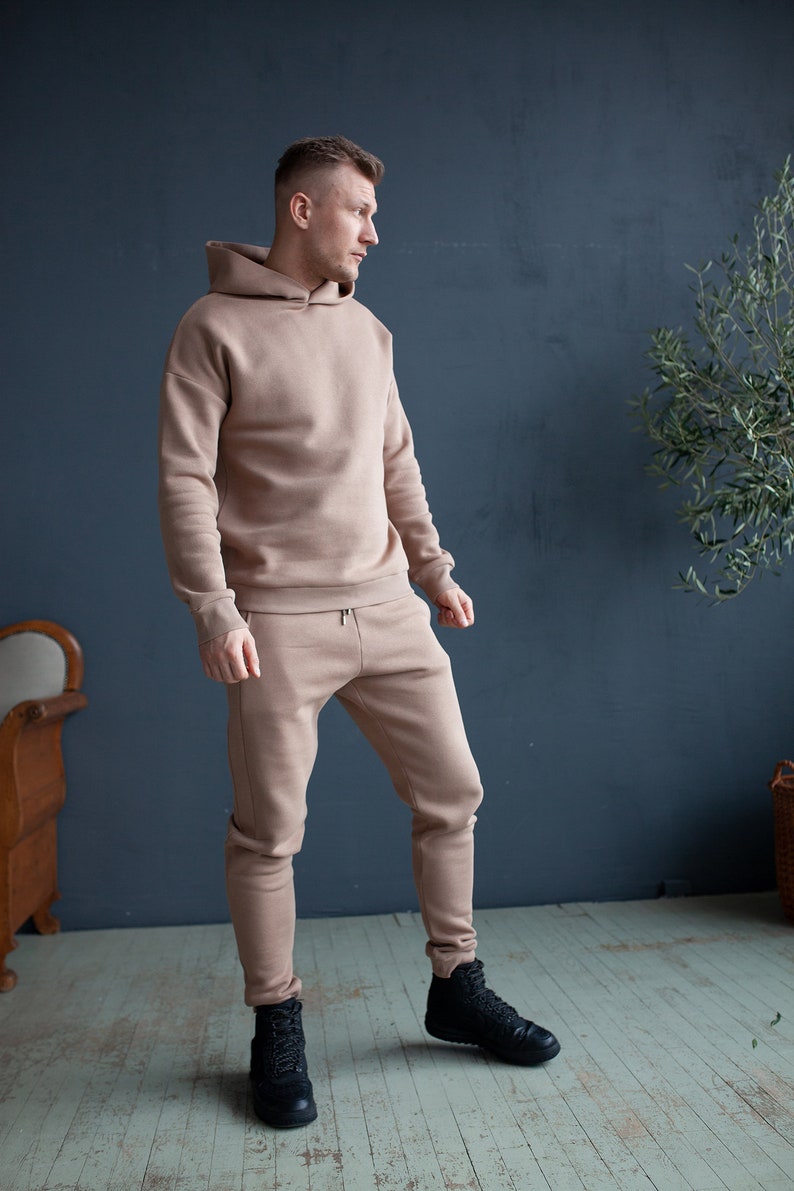 Black casual man's/woman's jumper and trousers set Light brown