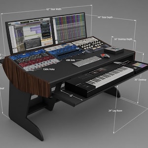 May include: A black studio desk with wood-grain side panels, featuring two computer monitors, a keyboard, a mouse, and a MIDI controller on a sliding tray. Dimensions include 62-inch total width, 44-inch total depth, 30-inch shelf, and 24-inch leg room.