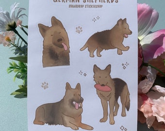 May include: A white sticker sheet titled GERMAN SHEPHERDS SUGARDROP STICKERSHOP featuring four illustrations of German Shepherd dogs in various poses, including one with a tongue out, one walking, one lying down, and one holding a pink disc.