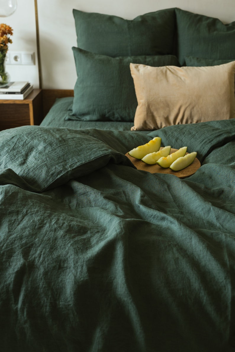 Forest green linen duvet cover on bed