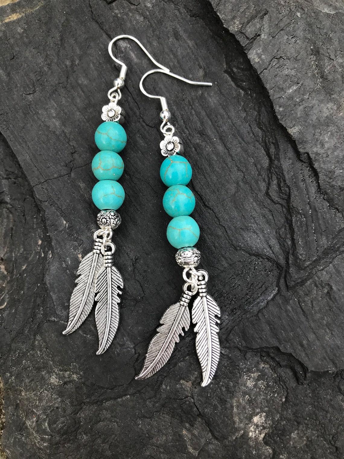 Turquoise and feather earrings Etsy
