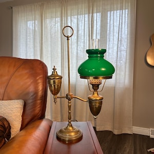 May include: A set of three ceramic mugs with a speckled, matte finish. The mugs are in shades of cream, light gray, and dark gray. Each mug has a simple, minimalist design, perfect for coffee or tea.