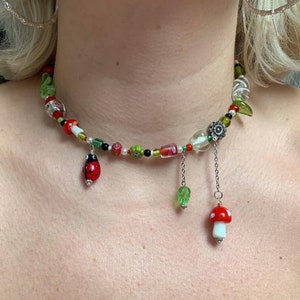 handmade beaded necklace with charms, colourful beaded fairy choker, multicolour glass bead jewellery, mushroom necklace, fairycore