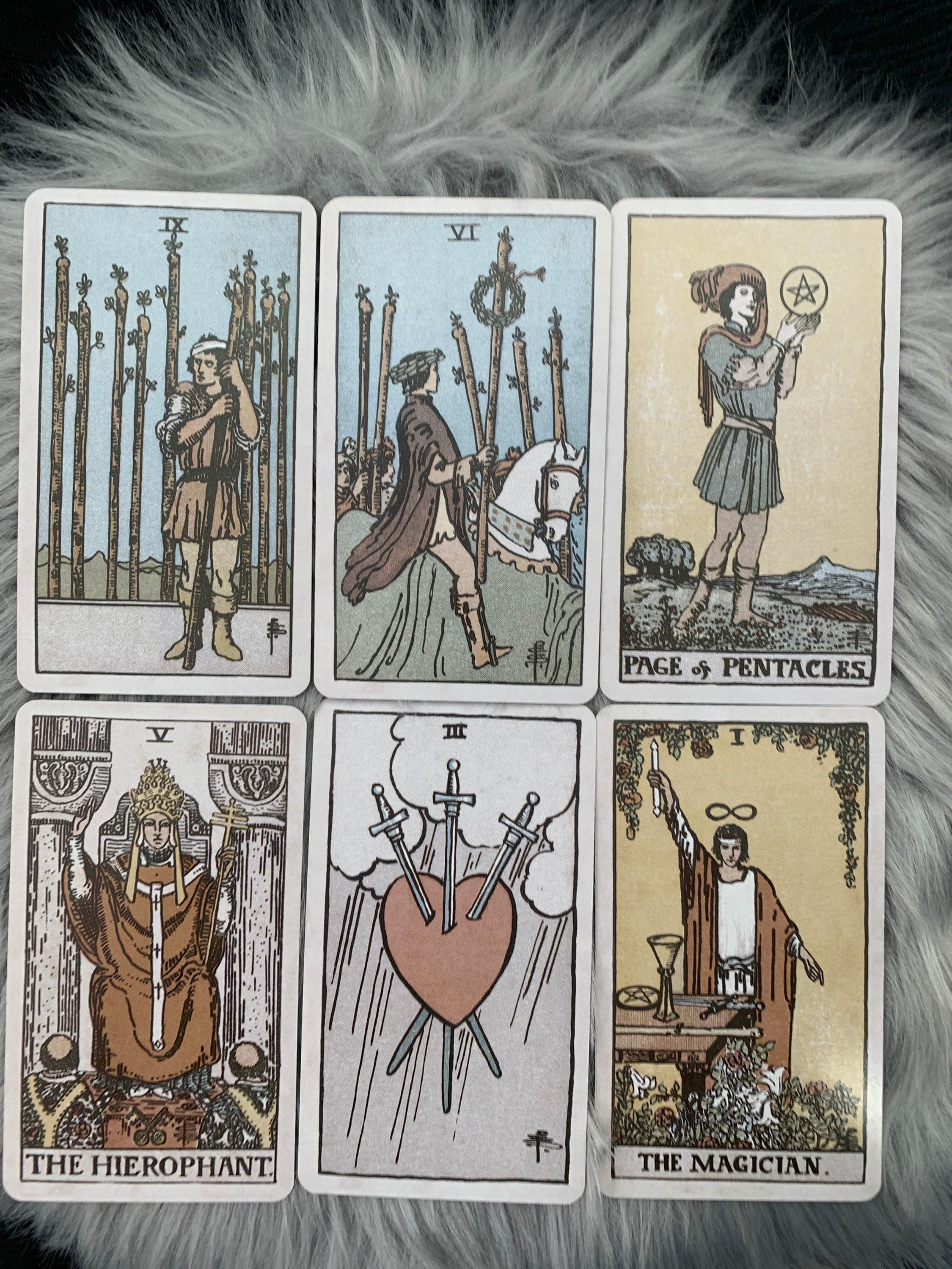 The Rider-Waite-Smith Tarot deck box and cards, showcasing the deck's iconic artwork