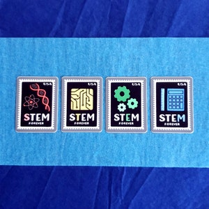 May include: Four black and gray square stickers with the word "STEM FOREVER" printed on each. Each sticker features a different symbol representing a STEM field: an atom and DNA strand, a circuit board, gears, and a ruler and calculator.