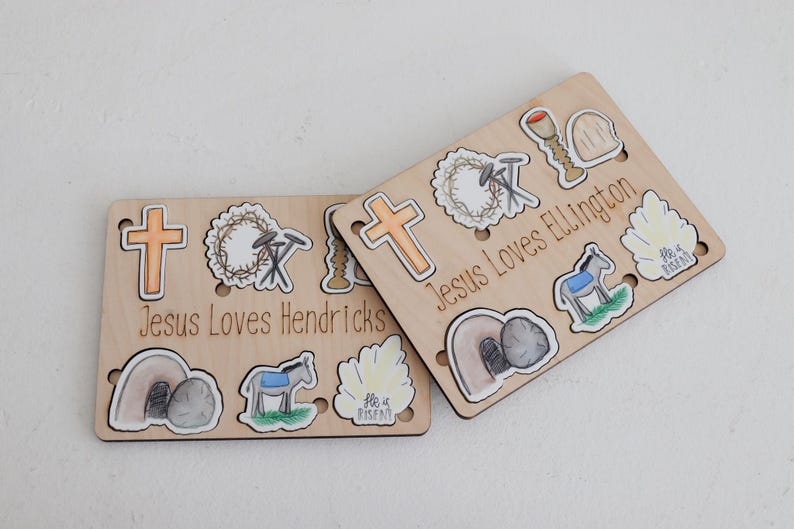 May include: Two wooden boards with images of religious symbols and the text "Jesus Loves Hendricks" and "Jesus Loves Ellington".