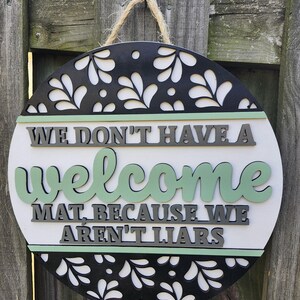 Witty Door Hanger, Funny Door Sign, We Don't Have a Welcome Mat Because ...