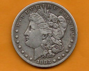 1883 - Srebrny dolar S Morgana w stonowanym kolorze - w obiegu, ma ponad 140 lat