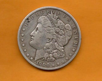 1900 - Srebrny dolar Morgana w tonacji - w obiegu, ma ponad 125 lat