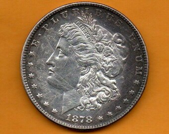1878 - Srebrny dolar P Morgana w stonowanym kolorze - w obiegu, ma ponad 145 lat