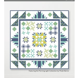 May include: A quilting pattern for a quilt called "Knick Knacks" designed by Natalie Crabtree. The quilt is 76 inches by 76 inches and features a variety of geometric shapes in shades of blue, green, yellow, and white. The pattern includes instructions for both a yardage quilt and a fat quarter bundle quilt.