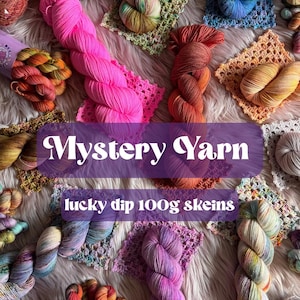 May include: A collection of multi-colored yarn skeins in various hues including hot pink, blue, orange, purple, and green, with some skeins resting on small crocheted squares. The image features the text Mystery Yarn and lucky dip 100g skeins.