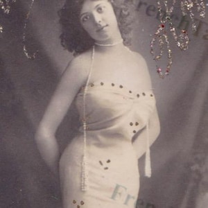 Franse ansichtkaart Bonne Annee zeemeermin vrouw uit 1906 glitterletters