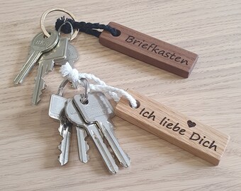Keychain with desired text, handmade from wood, 5 colors to choose from, personalized with laser engraving, including ribbon in black or white