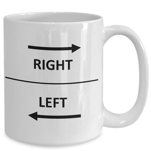 May include: White ceramic mug with black text and arrows. The text reads "RIGHT" and "LEFT" with arrows pointing in the corresponding directions.