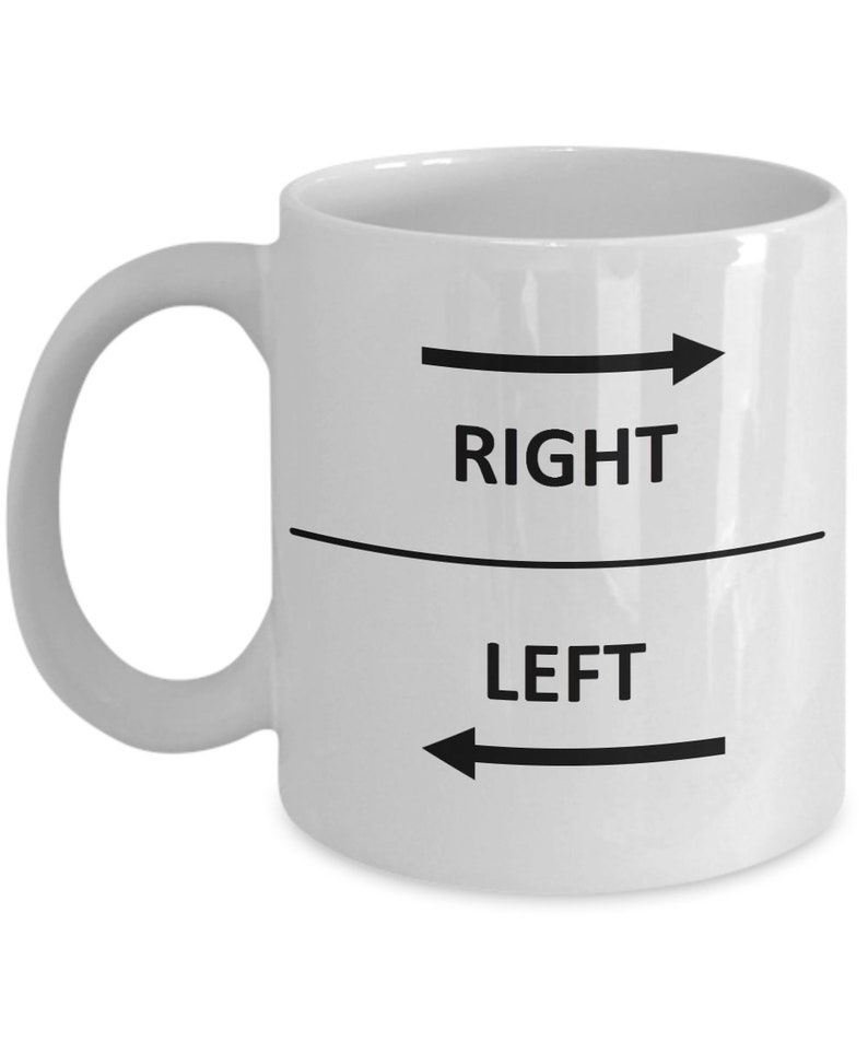 May include: White ceramic coffee mug with black text and arrows. The text reads "RIGHT" and "LEFT" with an arrow pointing to the right above the word "RIGHT" and an arrow pointing to the left below the word "LEFT".