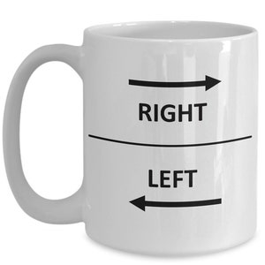 May include: White ceramic coffee mug with black text and arrows. The text reads "RIGHT" above a line and "LEFT" below the line. The arrow pointing to the right is above the line and the arrow pointing to the left is below the line.