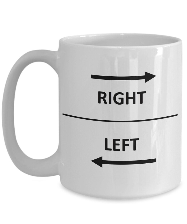 May include: White ceramic coffee mug with black text and arrows. The text reads "RIGHT" above a line and "LEFT" below the line. The arrow pointing to the right is above the line and the arrow pointing to the left is below the line.