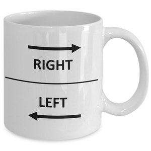 May include: White ceramic coffee mug with black text and arrows. The text reads "RIGHT" and "LEFT" with arrows pointing in the corresponding directions.