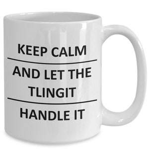 May include: White ceramic coffee mug with black text that reads "Keep Calm and Let the Tlingit Handle It."