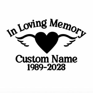 May include: Black and white memorial sticker with a heart and wings. The text reads "In Loving Memory Custom Name 1989-2023".