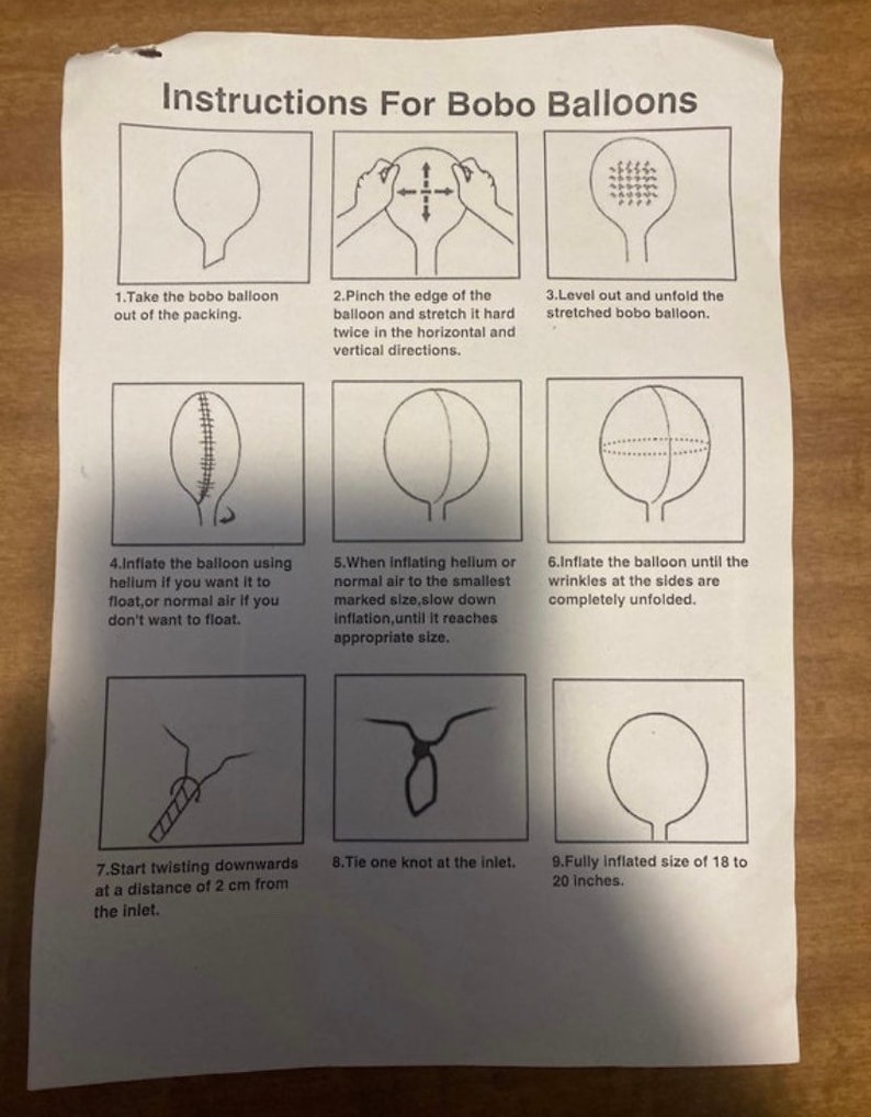 May include: Instructions for inflating Bobo balloons.  The instructions include illustrations showing how to inflate the balloon, tie a knot, and the fully inflated size of 18 to 20 inches.