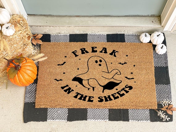 Freak In The Sheets Ghost Halloween Doormat Get into the Halloween spirit with this DIY Freak In The Sheets Ghost Halloween Doormat. This fun and spooky project is perfect for adding a touch of festive flair to your front door and welcoming trick-or-treaters in style.