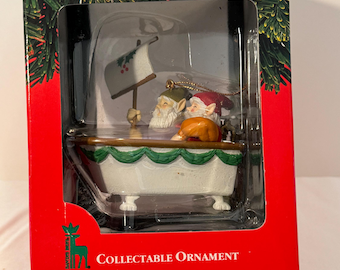 Santa’s Best Christmas Charmers Collectable Ornament- Elves/Santas in a Bathtub Sailboat