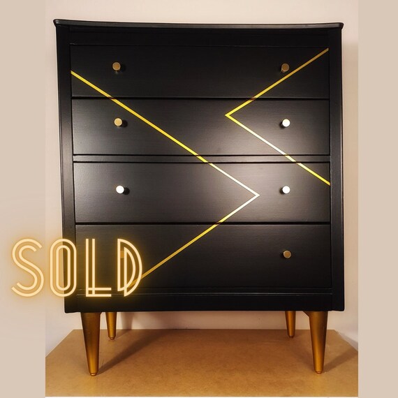 Black and gold chest discount