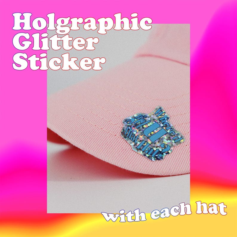 a picture of a pink hat with a blue brooch