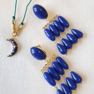 Boucles d'oreilles pendantes multirang perles résine Bleu oval clous